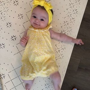 Yellow floral romper with bow